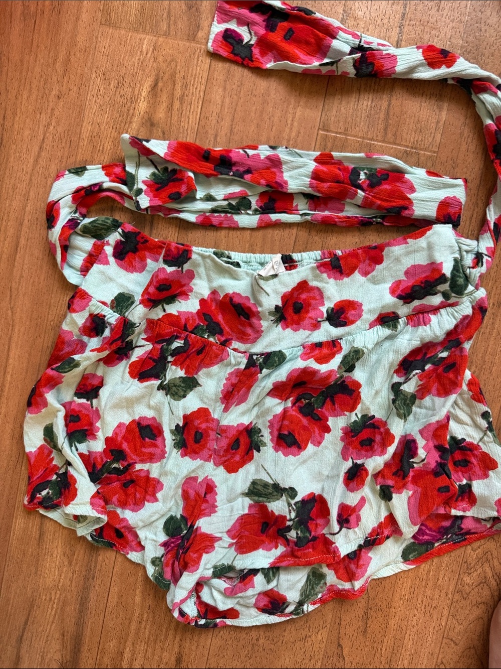 Billabong Red Floral Shorts on Light Background